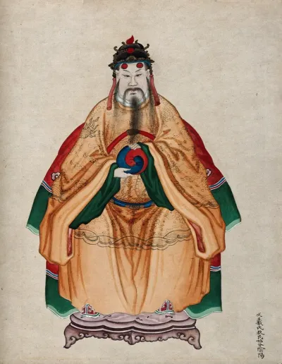 Chinese Emperor Fu Hsi, wearing traditional costume, holding the 'Yin-yang' symbol