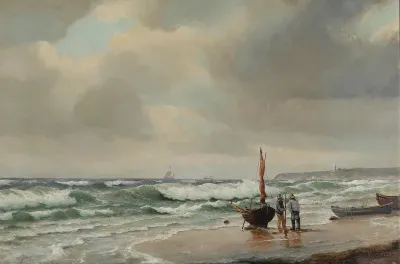 Coastal scenery with fishing boats on the beach.