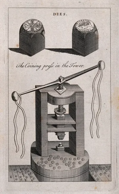Coinage: a coin press with dies, for minting coins, used in the Royal Mint