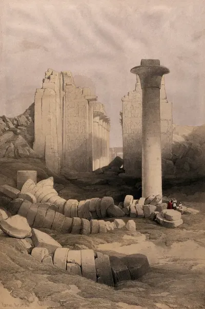 Column of the pharaoh Taharqa, with temple ruins at Karnac, Thebes, Egypt