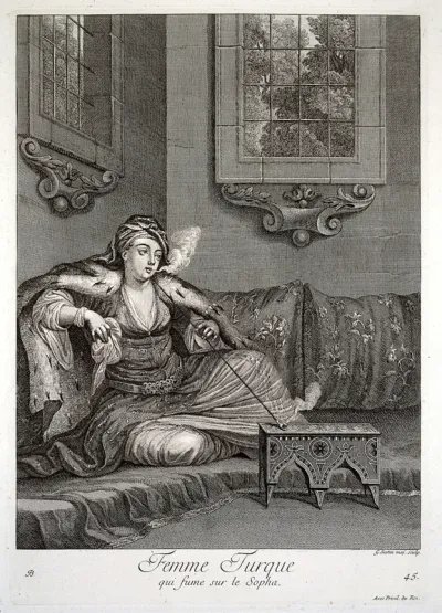 Constantinople: a lady seated on a sofa, smoking a pipe