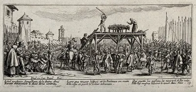 Criminal soldiers are broken on the wheel on a scaffold in the middle of a marketplace