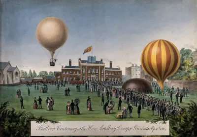 Crowds gather at the parade ground of the Honourable Artillery Company in London to watch two hot-air balloons