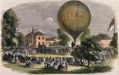 Crowds of people gathered at an entertainment at Basford, Staffordshire, including music and a balloon