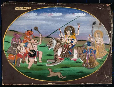 Devi Durga seated on a tiger, along with two other goddesses, prepares to battle the five demons