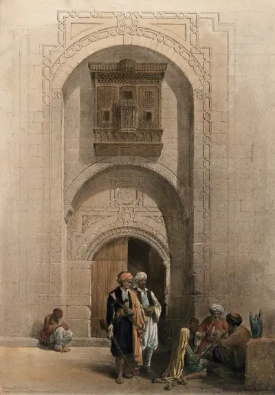 Doorway to an Arabian mansion, with men smoking outside, Cairo, Egypt