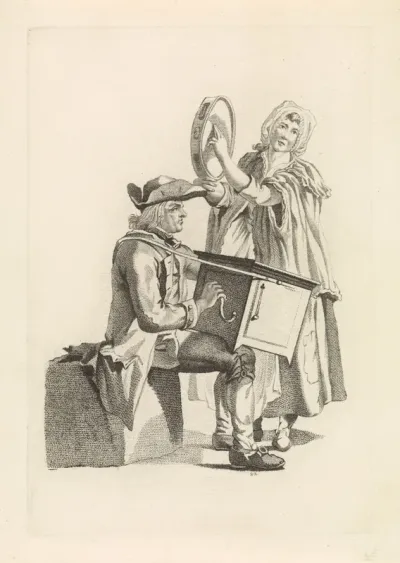 Draaiorgelspeler en vrouw met tamboerijn