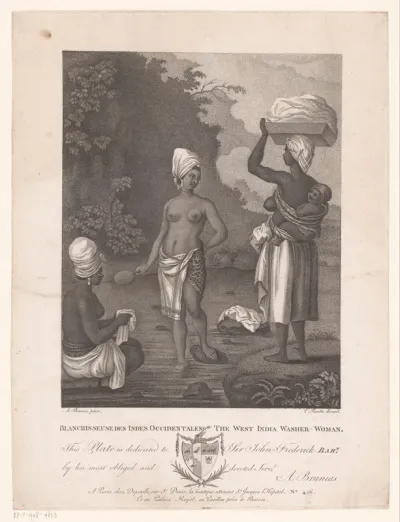 Drie vrouwen doen de was in een rivier in het westen van India