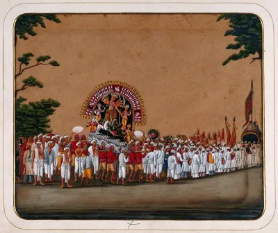 Durga Puja: a procession carrying an idol of Durga to honour her victory over evil