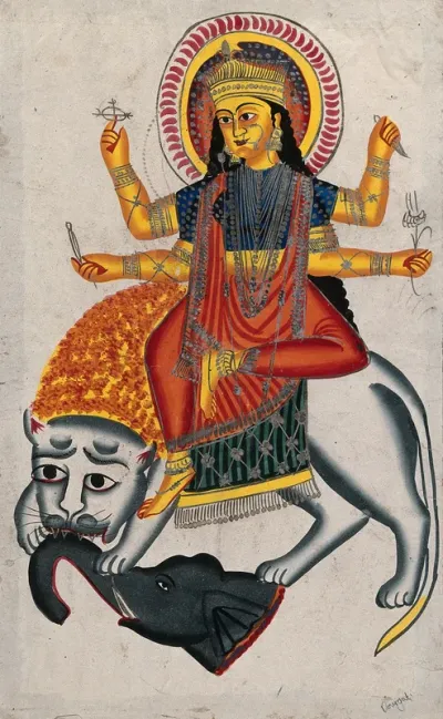 Durga riding on her lion killing a demon