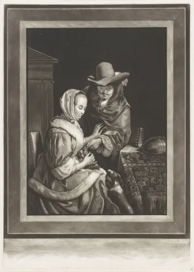 Een man en een vrouw met twee honden