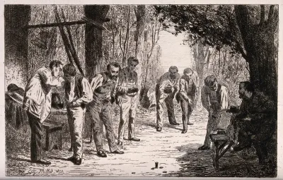 Eight men playing quoits in a woodland clearing