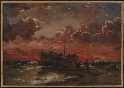 Et vrag på Jyllands vestkyst ved solnedgang