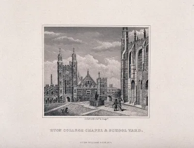 Eton College, Berkshire: a couple with their dog walking through the school courtyard by the chapel