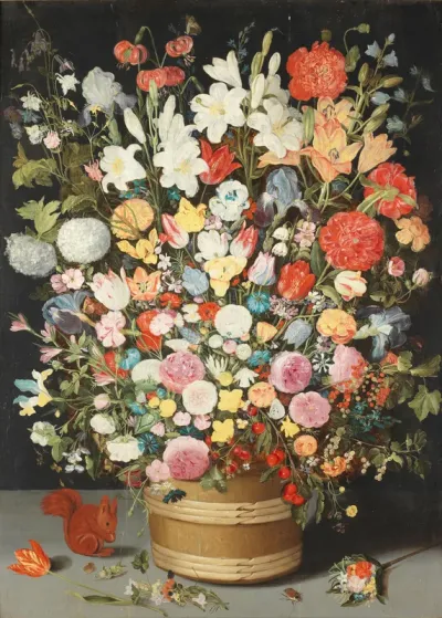 Extensive bouquet of mixed spring and summer flowers in a wooden tub beside a squirrel