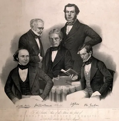 Famous chemists, gathered around a table