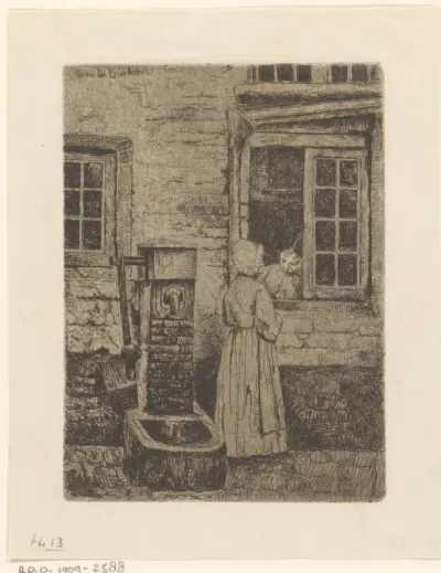 Femme causant près d'une pompe
