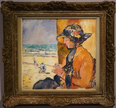 Femme et enfants au bord de la mer