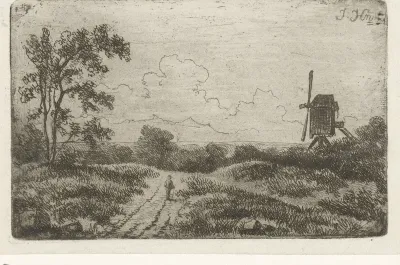 Figuur op een weg bij een molen