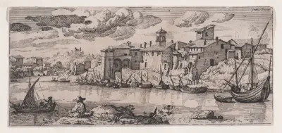 Fishermen on a river across from a town