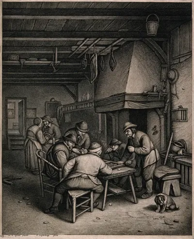 Five men indoors round a table smoking and playing backgammon, behind a man and women talk