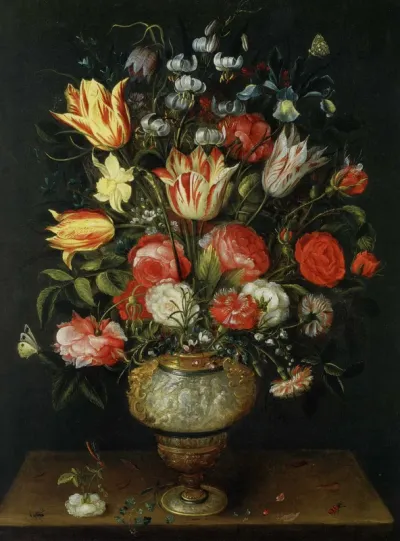 Flowers in an antique vase on a table