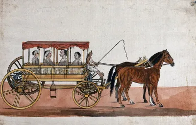 Four people sitting in a horse drawn carriage with a canopied top