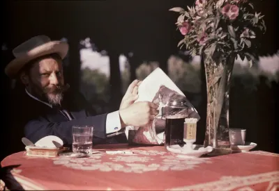 Frank Eugene Seated at Table