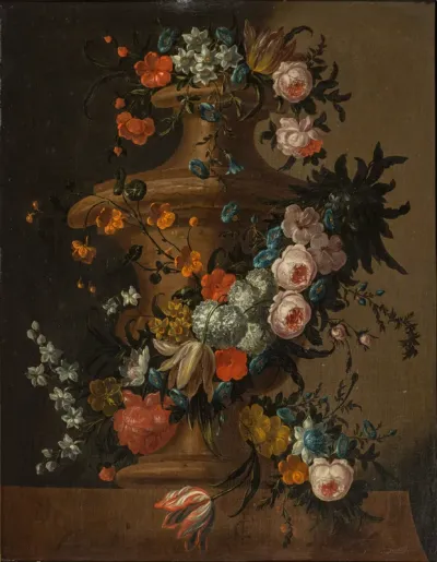 Garden vase surrounded by a garland of various flowers