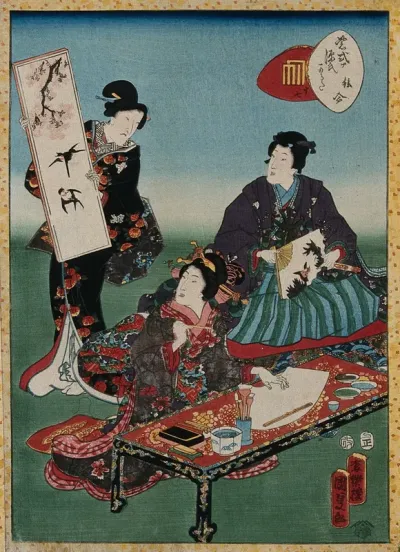 Genji holds a painted fan: the young woman at the elegant table is about to paint a fan: the older woman holds up a painted screen panel, perhaps providing the girl with a model; everything is elegant and fashionable