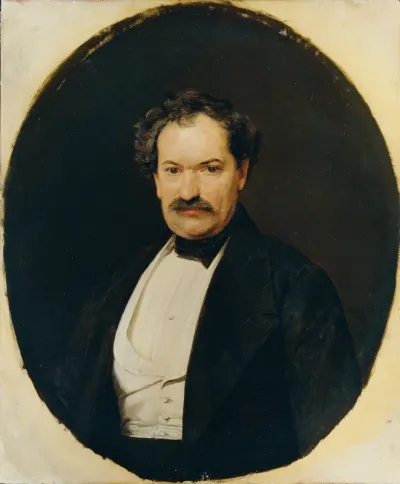 Gentleman in black skirt with white vest