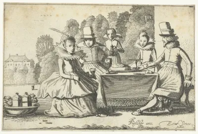 Gezelschap gebruikt een maaltijd aan een tafel in een tuin