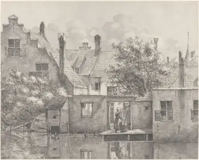 Gezicht op de achterkant van huizen aan het water
