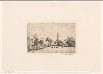 Gezicht op een dorp en koeien in een weiland
