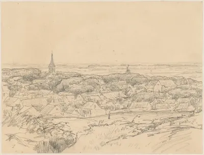Gezicht op een dorp in de duinen