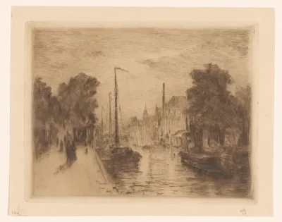 Gezicht op een gracht in Den Haag bij avond