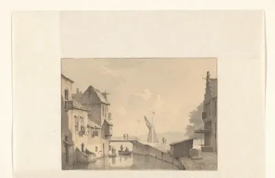 Gezicht op een gracht in een stad