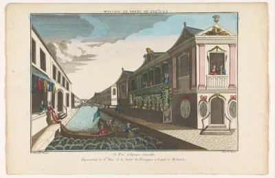 Gezicht op een straat aan een gracht te Leiden