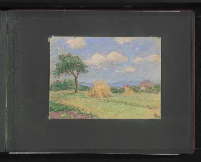 Gezicht op een veld met hooibalen