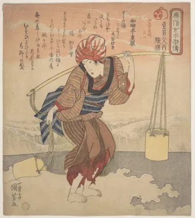 Girl Filling a Bucket with Sea Water