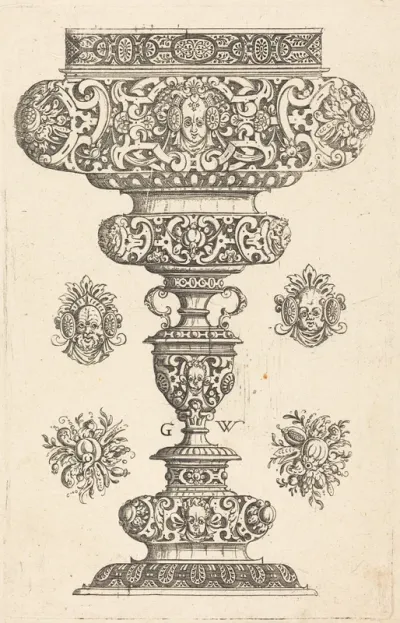 Goblet, rim decorated with masque and bouquet of fruit