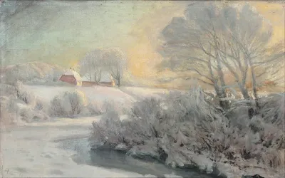 Golden skies over a snow covered landscape.