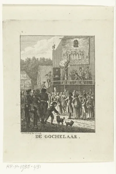 Goochelaar treedt op voor publiek op kermis