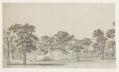 Groep huizen tussen bomen