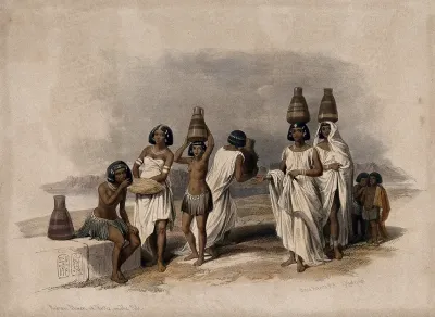 Group of Nubian women and children resting by the Nile at Korti, Sudan