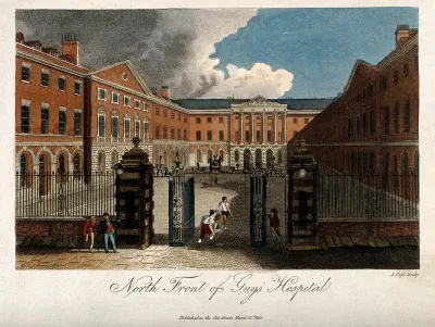 Guy's Hospital, Southwark: the entrance courtyard, with a patient being carried in on a stretcher