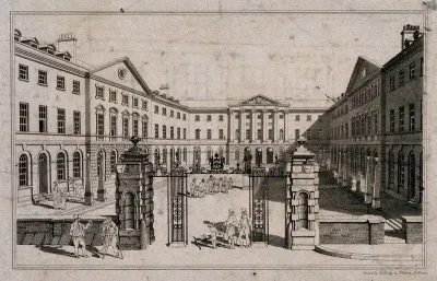 Guy's Hospital, Southwark: the entrance courtyard, with a patient being carried on a stretcher