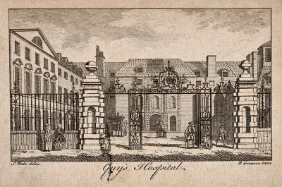 Guy's Hospital, Southwark: the entrance courtyard, with various patients near the gate