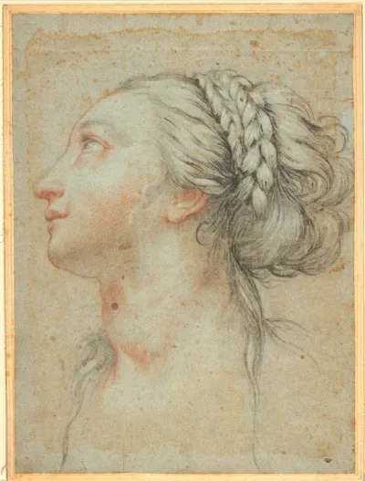 Head of a young woman in profile to the left