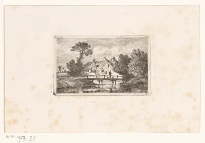 Hengelaar op een bruggetje bij een boerderij